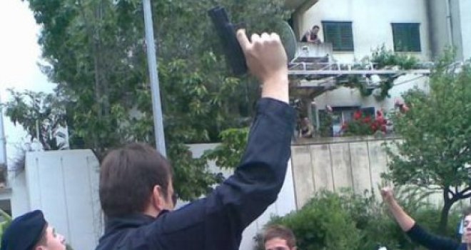 Policajac se upucao iz službenog pištolja na svadbi svog sina!